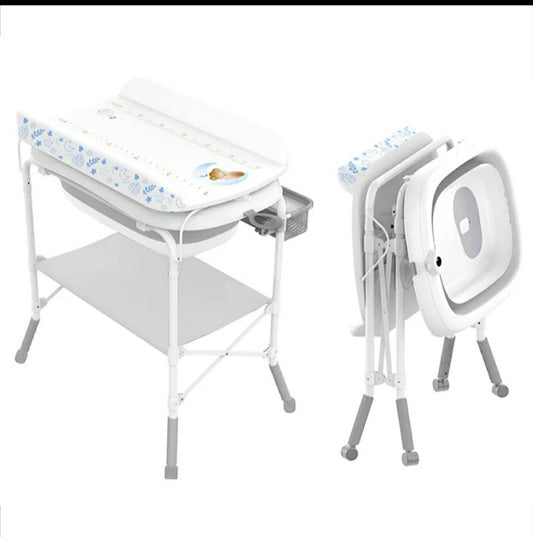 محطة العناية المتكاملة بالطفل 3 في 1 (طاولة غيار، حوض استحمام، ومنظم أغراض) قابلة للطي