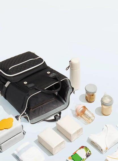 حقيبة الأم الأصلية المقاومة للماء "ليك وين دايموند" الإصدار السابع - جيل الألماس السابع من ليك وين. حقيبة عصرية بخصائص مقاومة للماء وجودة ممتازة، مثالية لتنظيم جميع مستلزمات طفلك الأساسية.