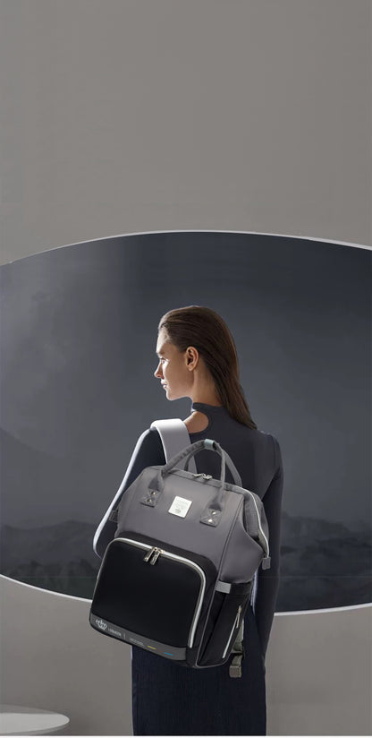 حقيبة الأم الأصلية المقاومة للماء من ليكوين، إصدار دايموند الجيل السابع: أناقة، فخامة، وتنظيم لا مثيل له لمستلزمات طفلك!