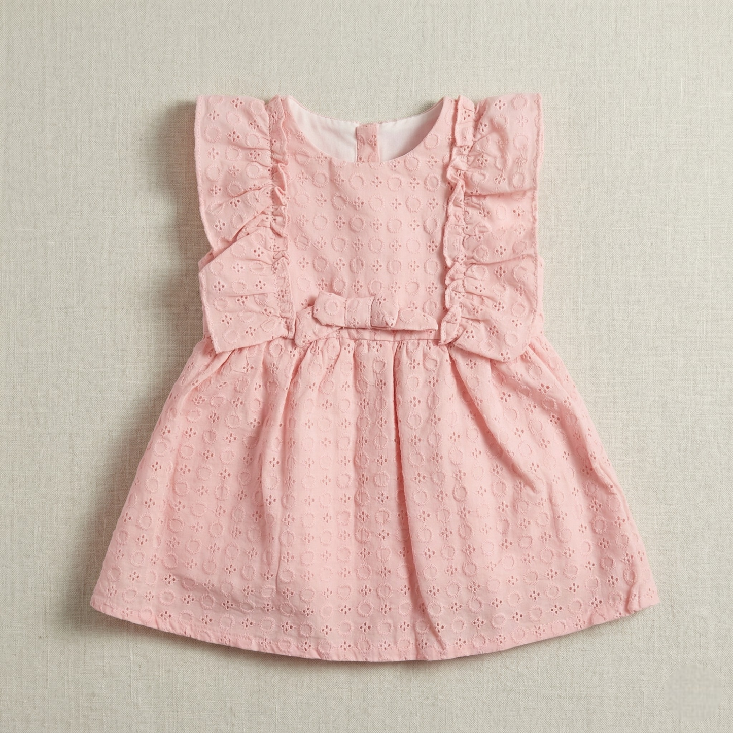 فستان أطفال قطن مطرز باللون الوردي مع كشكشة وفيونكة