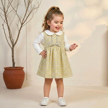 فستان أطفال بناتي كلاسيكي بنقشة الكاروهات الصفراء مع ياقة بيضاء وفيونكة أنيقة