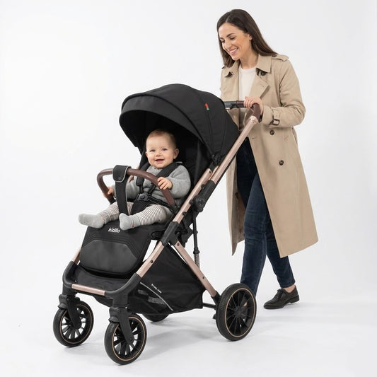 عربة الأطفال الفاخرة "كيديلو" (Kidilo 6530PRO) – أناقة اللون الأسود مع لمسات الذهب الوردي العصرية