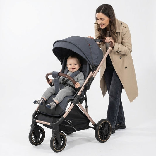 عربة الأطفال الفاخرة "كيديلو" (Kidilo 6530PRO) – أناقة اللون الرصاصي مع لمسات الذهب الوردي العصرية