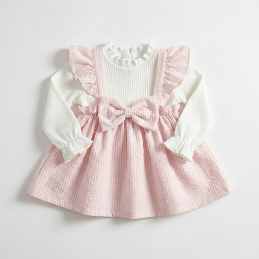 فستان بناتي رقيق بنقشة "الكاروهات" الوردية واللون الأبيض مع فيونكة كبيرة - تصميم كلاسيكي ناعم